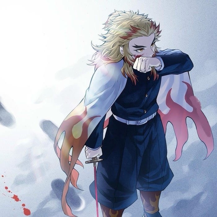 Blazing eyes and fearless smile seen in rengoku pfp