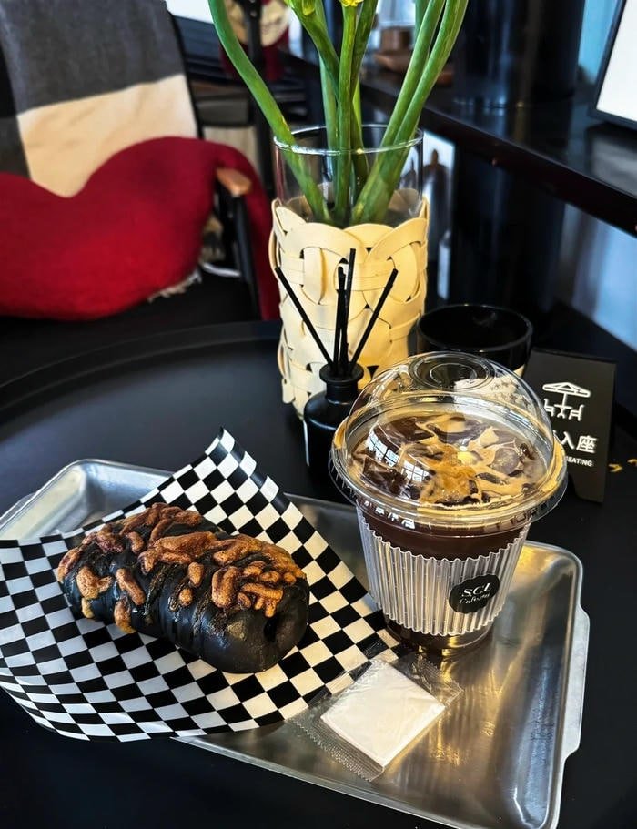 cozy cafe atmosphere reflected in coffee pfp image