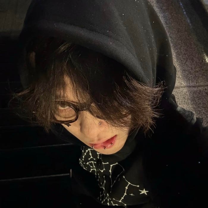 Diamond stud earrings sparkling inside vivid drippy pfp